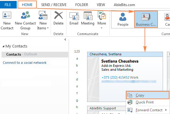 To prevent attaching a .vcf file, copy business card directly from Outlook contacts.